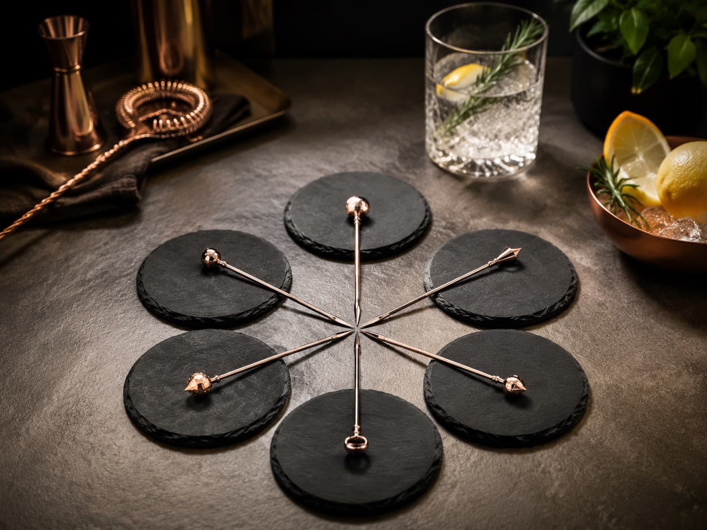 Cocktail Pick & Coaster Set arranged on a dark stone surface